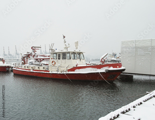 detail of fireboat covered by snow