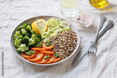  Quinoa salad with sweet potato and broccoli. Detox buddha bowl with quinoa, sweet potato and broccoli. Selective focus