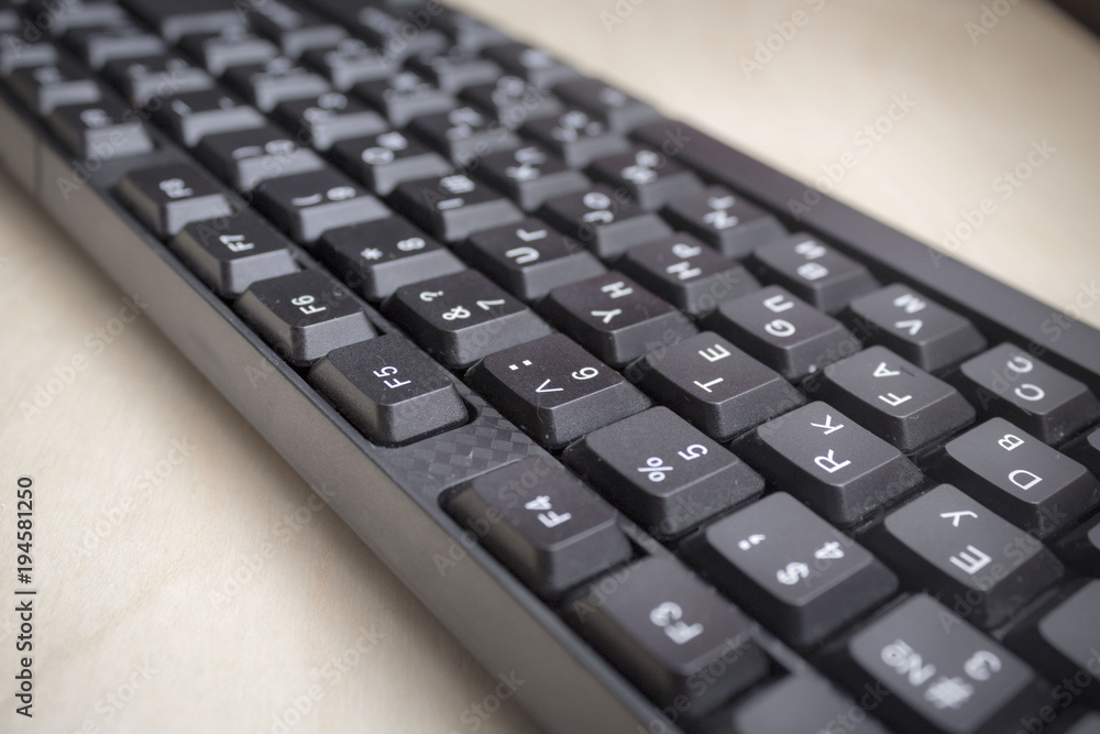 PC Keyboard on wooden background