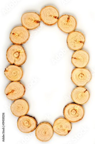 Number made of wood slice on a white background. 0