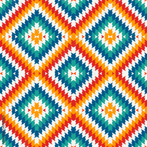 Ethnic style seamless pattern with chevron lines. Native americans ornament. Tribal motif. Colorful mosaic wallpaper.
