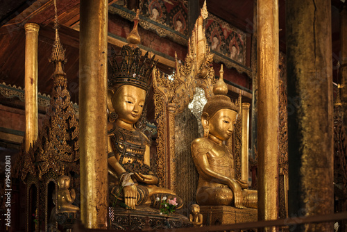 Statues of buddha in a monastery in a small village on Inle lake