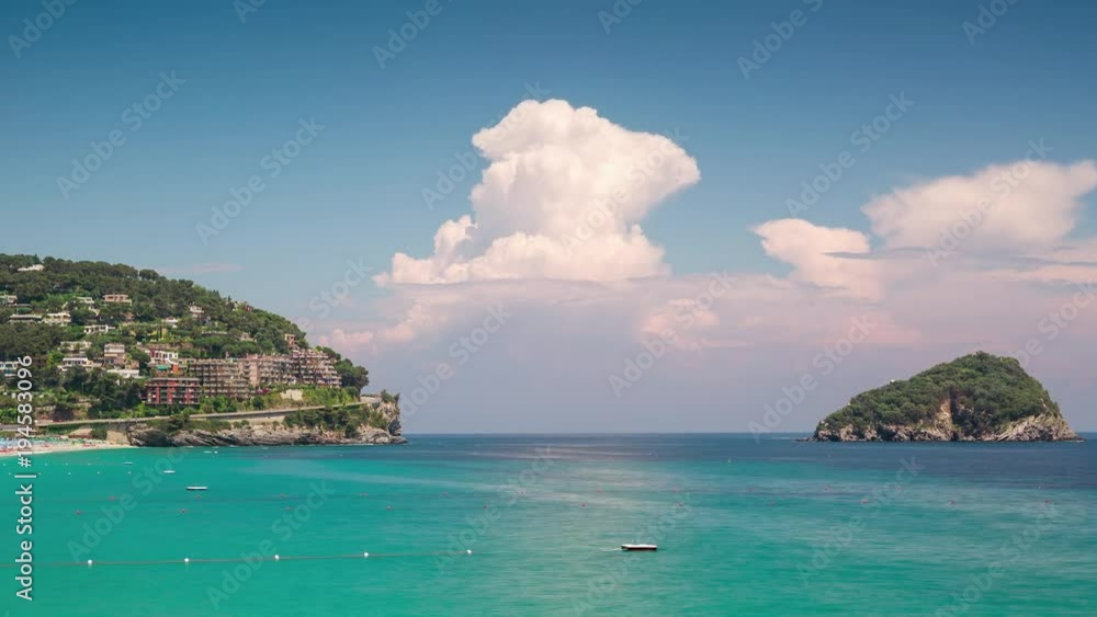 NOLI, ITALY - MAY 3, 2017: Timelapse of Liguria coast. Blue sky, blue sea. Clouds moving. NOLI, ITALY - MAY 3, 2017: Timelapse of Liguria coast. Blue sky, blue sea. Clouds moving.