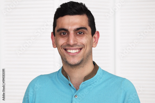 Obraz na plátně Close-up of a happy arabic man smiling