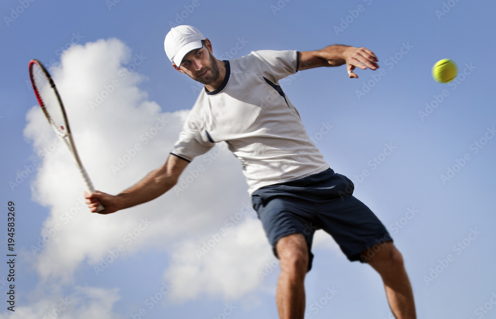 male tennis player in action, motion blurs