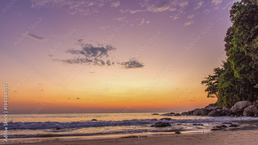 Sunset at northern end of Karon Beach in Thailand Phuket Sunset at northern end of Karon Beach in Thailand Phuket