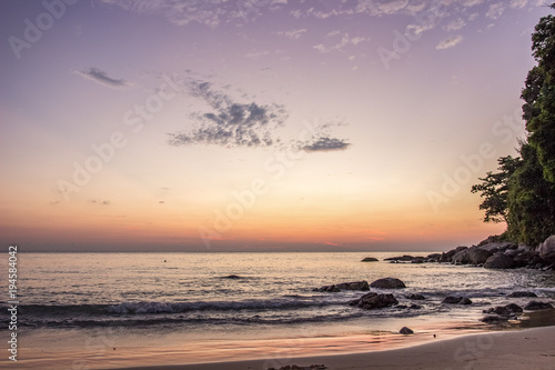 Sunset at northern end of karon Beach in Thailand Phuket