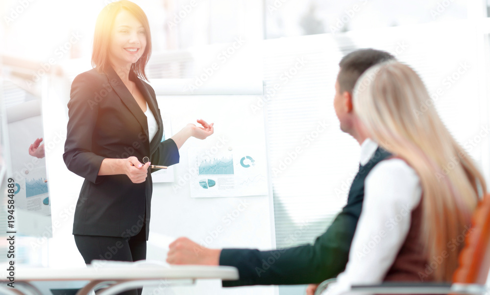 business woman conducts a workshop with the business team. business woman conducts a workshop with the business team.