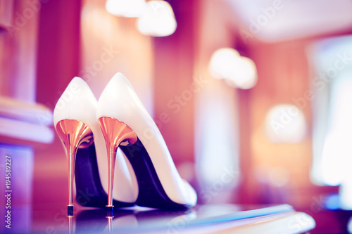 Konstfotografi Trendy ultraviolet toned picture of bridal stiletto heel shoes