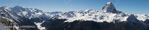 panoramic view on beautiful mountain range in pyrenees with mountain top pic du midi, france photo