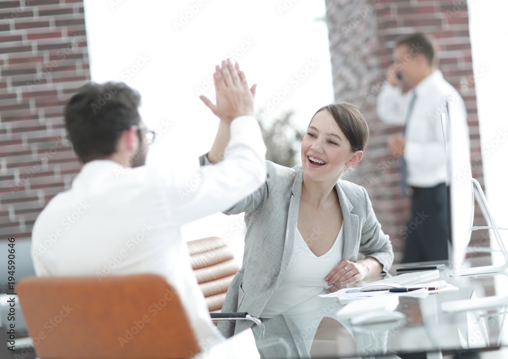 Fototapeta premium victorious business team celebrating your win