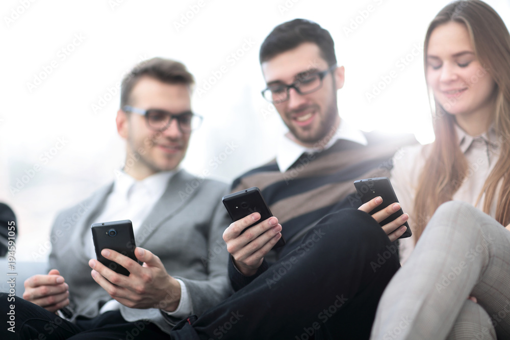 closeup. employees talking in the workplace closeup. employees talking in the workplace