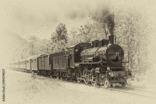 Old steam locomotive in vintage style photo