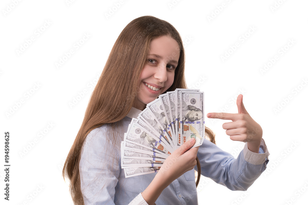 Beautiful girl holding dollars in hands. Isolated on white background. Beautiful girl holding dollars in hands. Isolated on white background.