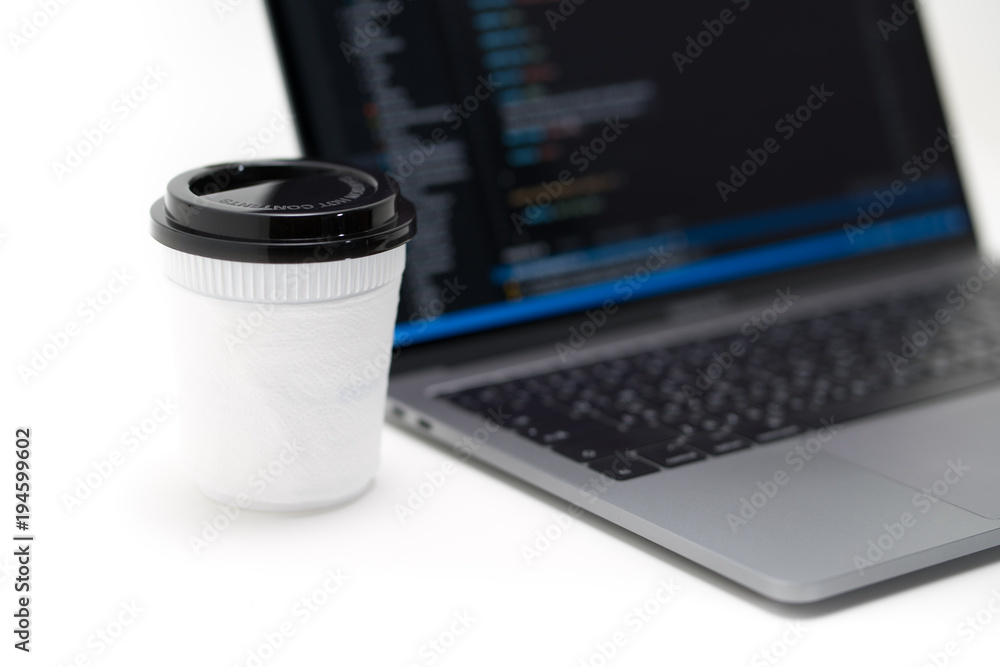 Laptop with blur screen on table with coffee mug Laptop with blur screen on table with coffee mug