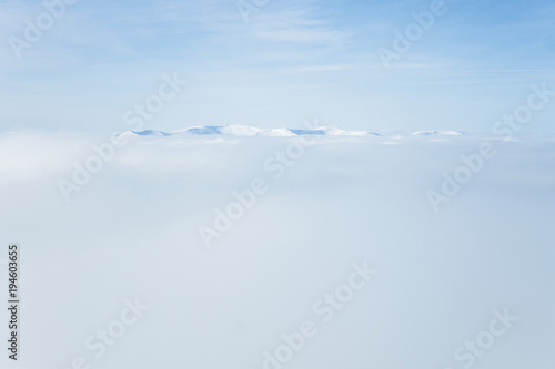 Fog in Gorgany mountains during winter storm
