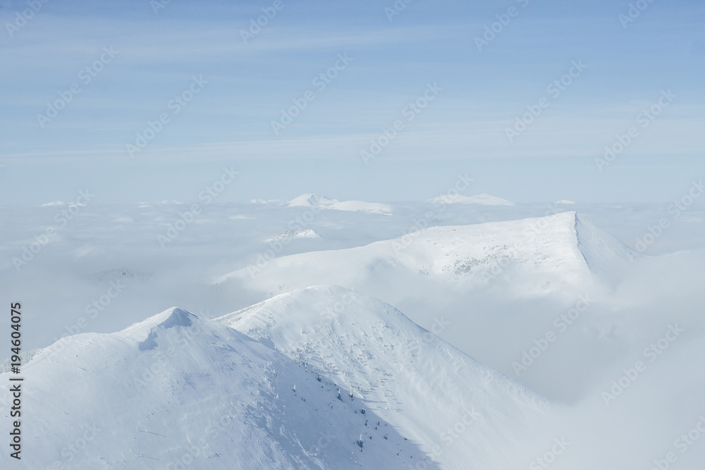View of white Gorgany mountains and cloudy sky View of white Gorgany mountains and cloudy sky