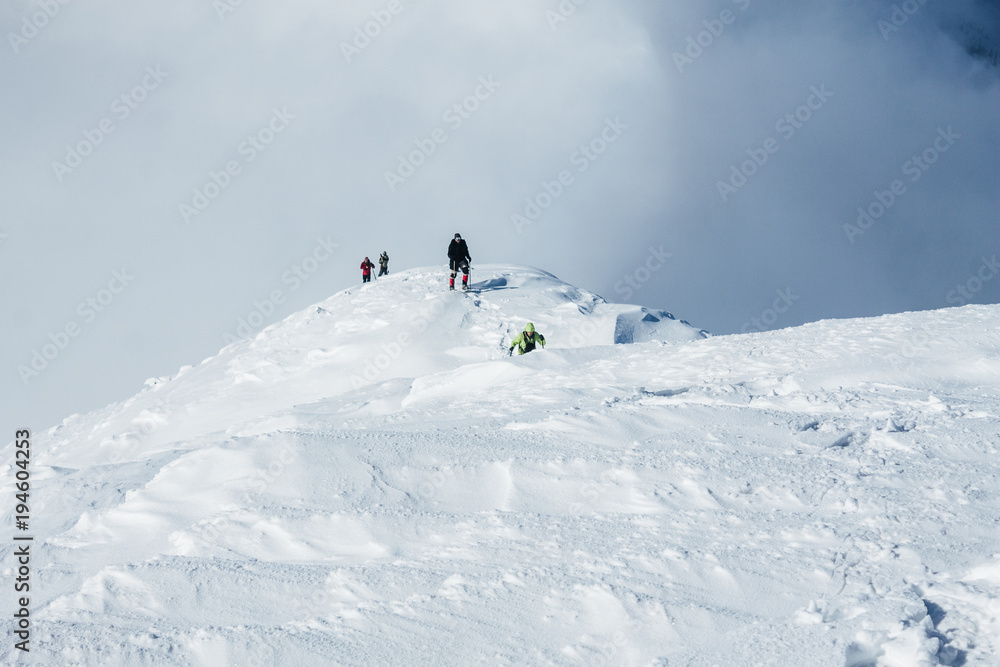 Team of climbers in winter Gorgany mountains