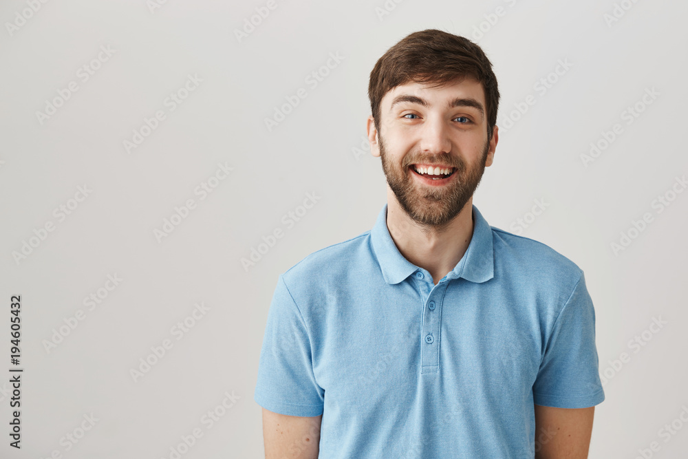 I am trully happy. Adorable caucasian bearded man with moustache in blue polo shirt, smiling broadly at camera and being in good mood. Cheerful guy once again tries to ask popular colleague on date I am trully happy. Adorable caucasian bearded man with moustache in blue polo shirt, smiling broadly at camera and being in good mood. Cheerful guy once again tries to ask popular colleague on date