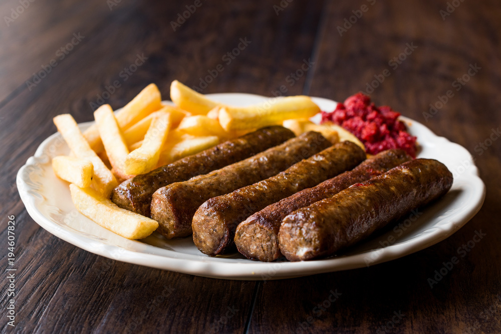 Balkan Cevapcici Kofta / Kofte with Potatoes and Tomato Sauce. Balkan Cevapcici Kofta / Kofte with Potatoes and Tomato Sauce.