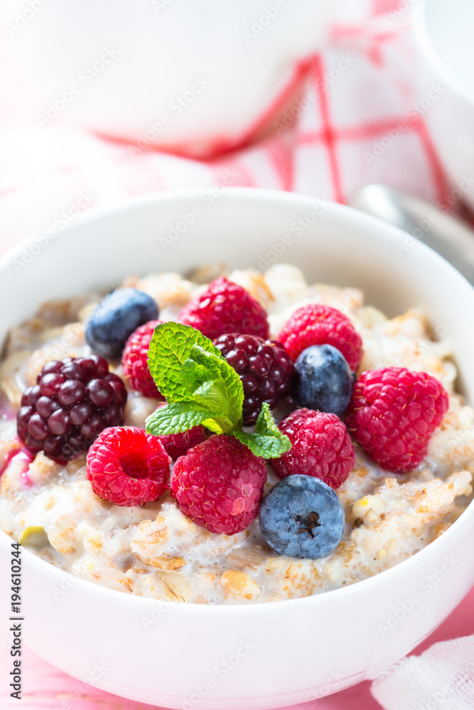Oatmeal porrige with milk and berries. Oatmeal porrige with milk and berries.