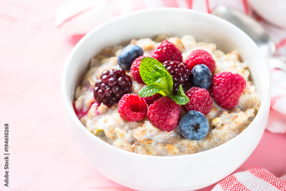 Oatmeal porrige with milk and berries. Oatmeal porrige with milk and berries.