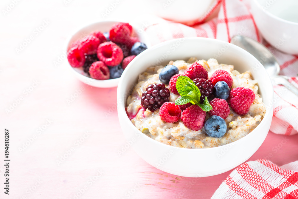 Oatmeal porrige with milk and berries. Oatmeal porrige with milk and berries.