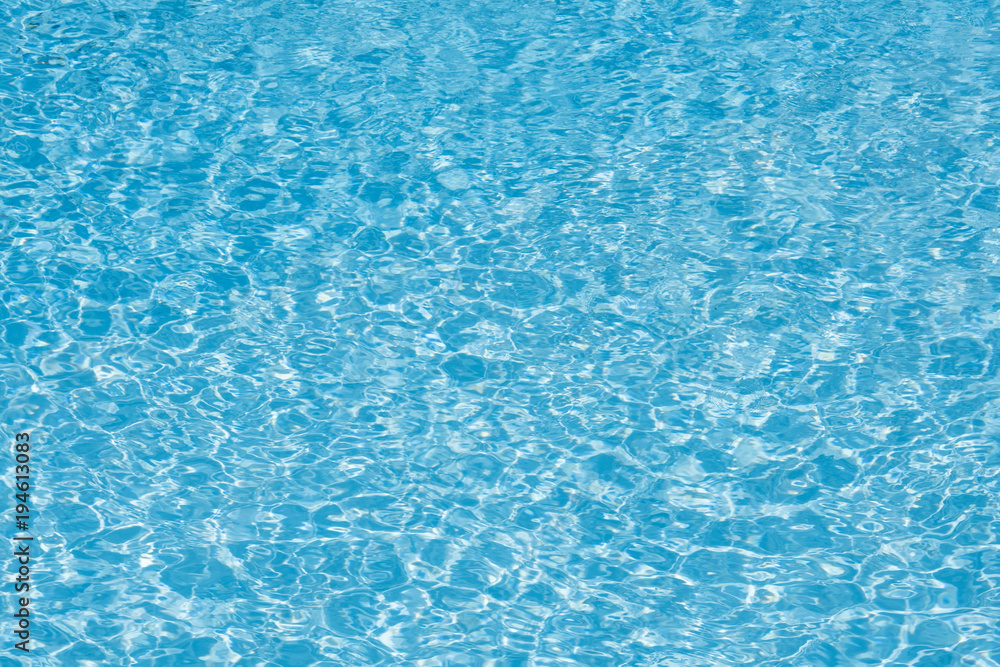 Wonderful blue and bright ripple water and surface in swimming pool, Beautiful motion gentle wave in pool