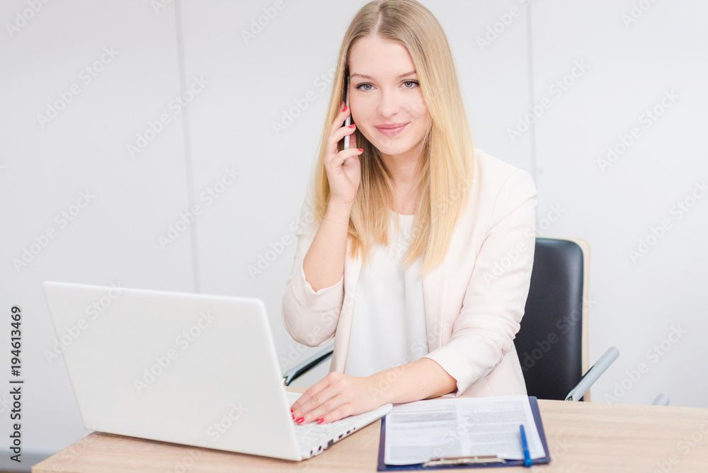 Young business woman working at modern office Young business woman working at modern office