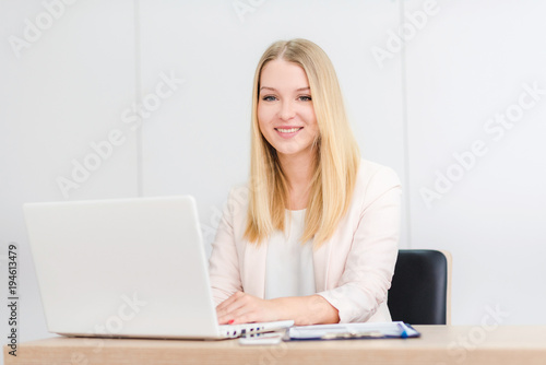 Young business woman working at modern office