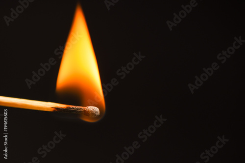 Triangular flame from a wooden match