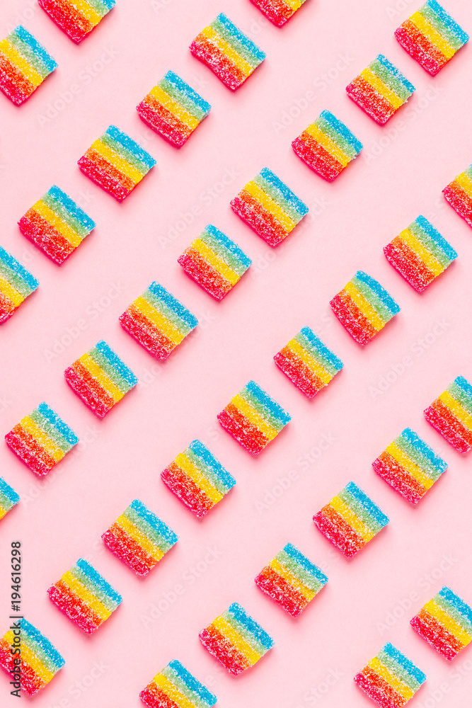 Colorful candies pattern on a pink background. Colorful candies pattern on a pink background.