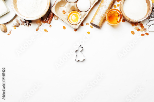 Easter baking ingredients  white food background  top view