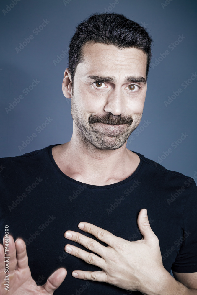 Young handsome man with beard and mustache studio portrait Young handsome man with beard and mustache studio portrait