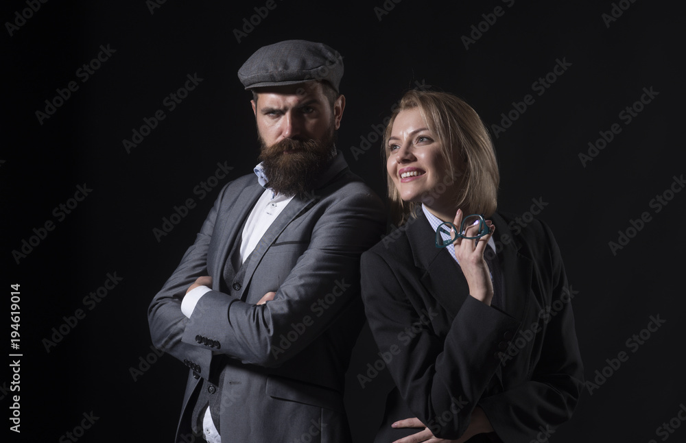 Man and woman in oldfashioned suit and hat Man and woman in oldfashioned suit and hat