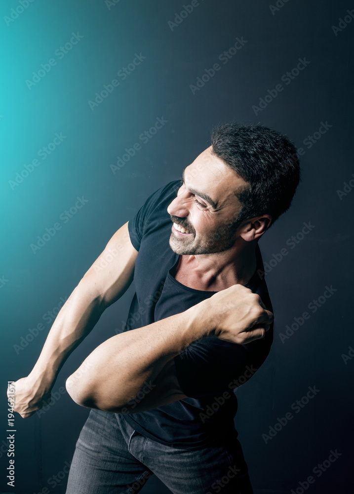 Man with moustache posing a happy facial expression Man with moustache posing a happy facial expression