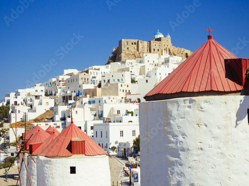 Chora of Astypapaia island ,Greece at daytime through a windmill photo