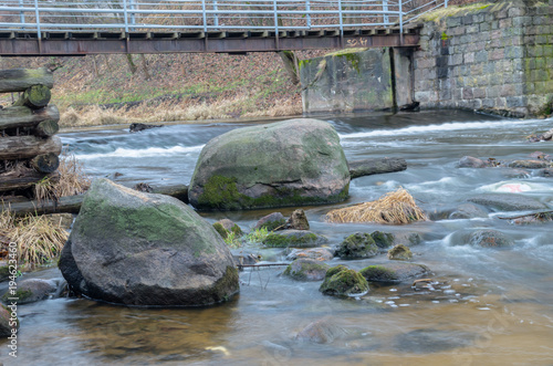 Waterfall on the artificial dam. Rezekne, Latvia photo