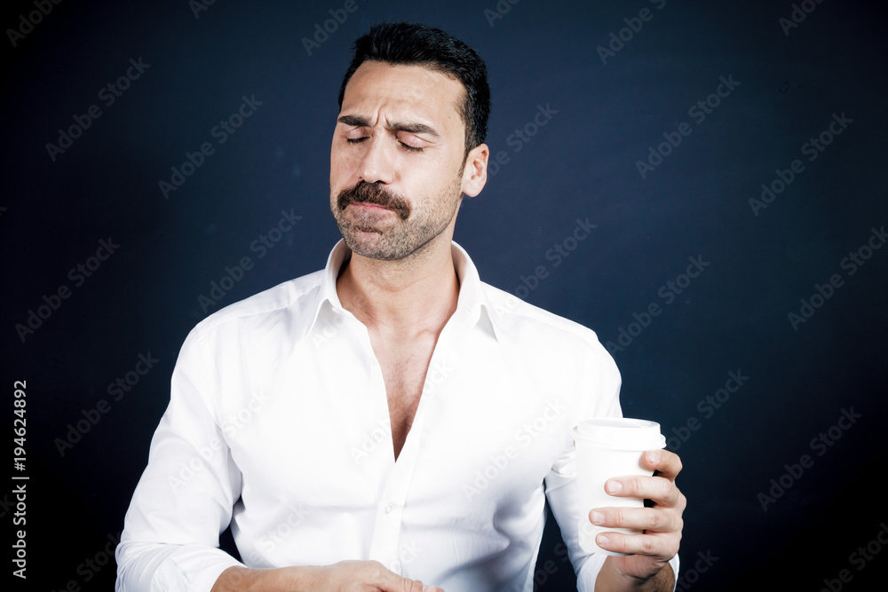 Young handsome man with beard and mustache studio portrait Young handsome man with beard and mustache studio portrait