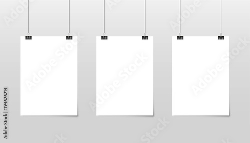 Poster template of a paper sheet. Hanging posters Set.