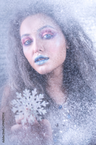 Fototapeta Naklejka Na Ścianę i Meble -  Winter portrait attractive girl in bright makeup