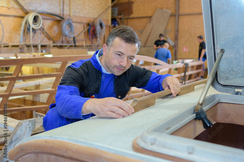 image of mature carpenter in the workshop