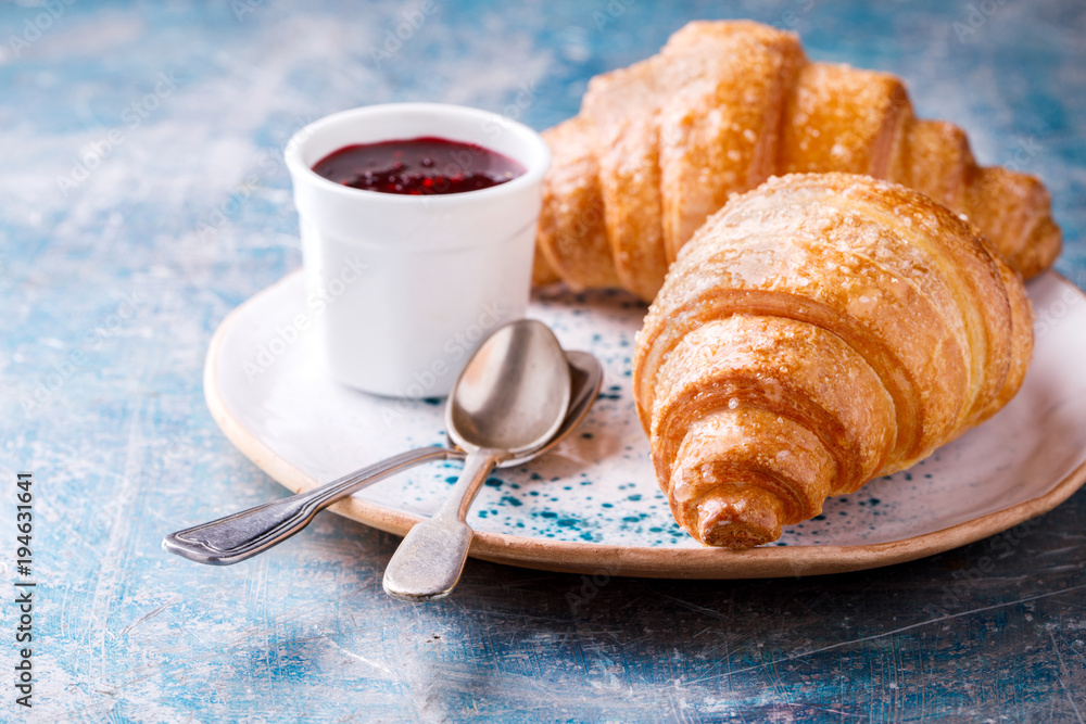 Breakfast Continental with Fresh croissants.Delicious Baking with Berry Jam Breakfast Continental with Fresh croissants.Delicious Baking with Berry Jam
