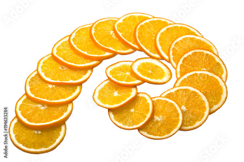 Orange slices isolated on white background. Have the form of a Fibonacci curve.
