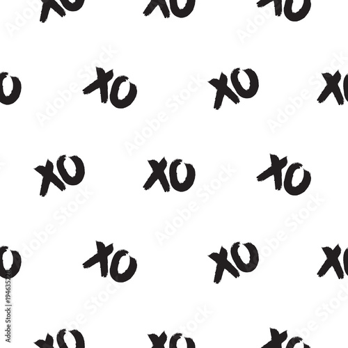Seamless pattern with xoxo words. Brush stroke black and white repeat vector background. photo