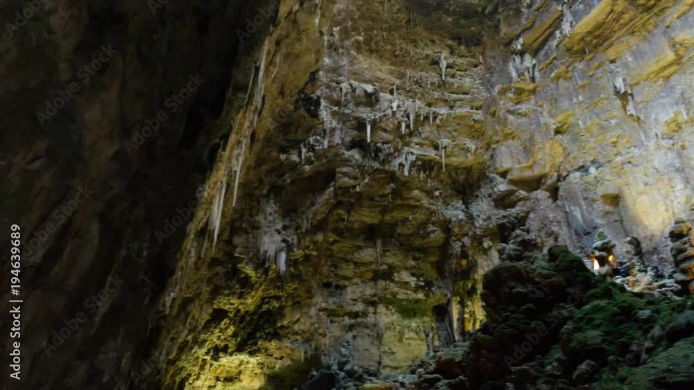 Inside lighting Cave Stone Wall - Grotte di Castellana, Italy Inside lighting Cave Stone Wall - Grotte di Castellana, Italy
