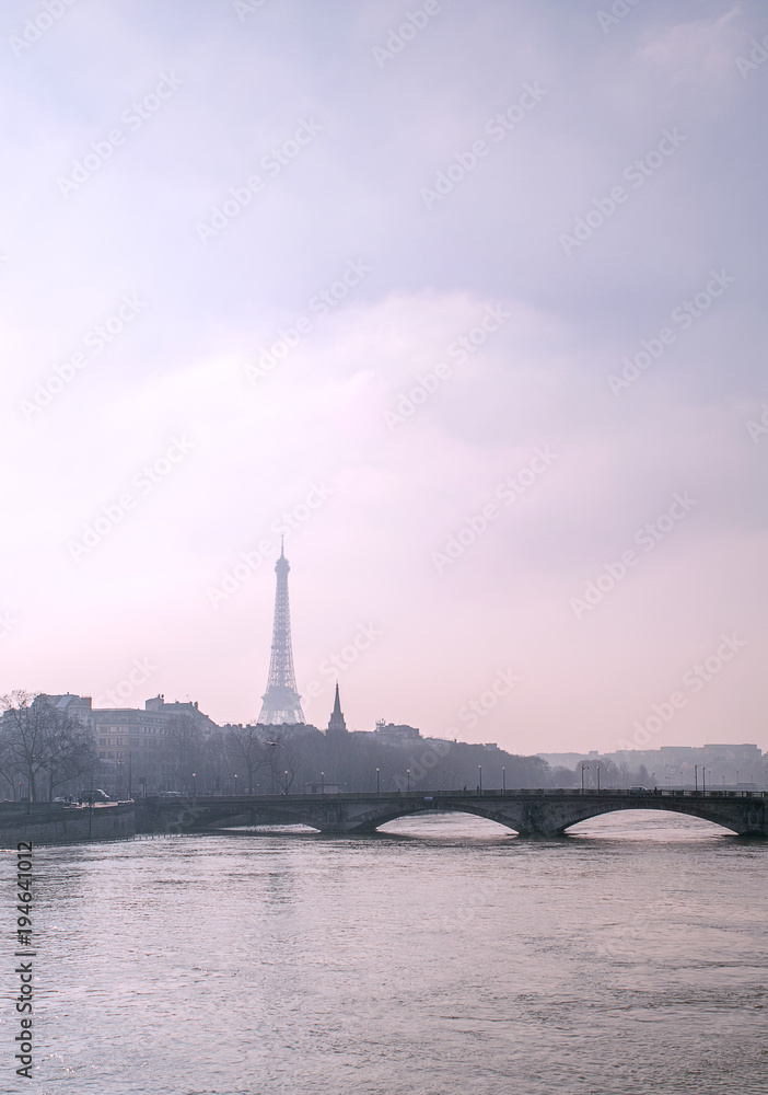 View of Seine River and Eiffel Tower at Sunset in Paris France