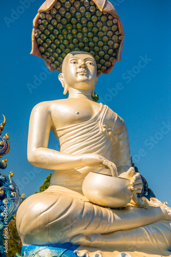 White Upakut monk statue photo