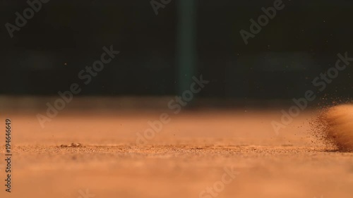 Wallpaper Mural Legs of a tennis man sliding on the ground Torontodigital.ca