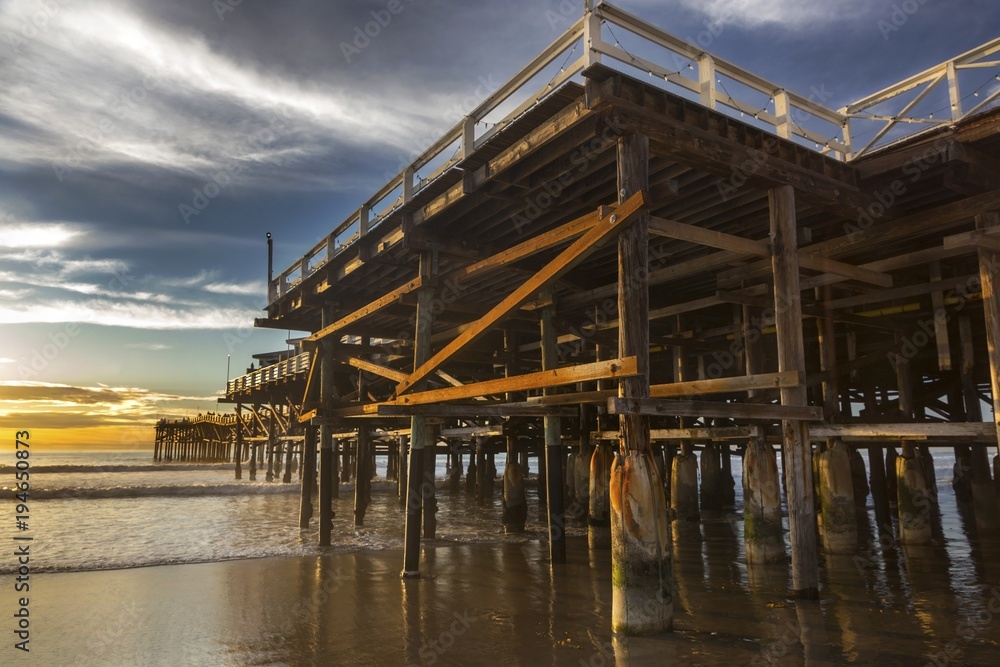 Pacific Beach Wooden Pier Structure and Pacific Ocean Beach Scenic Sunset in San Diego California